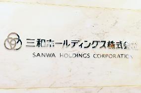 Sanwa Holdings signboard and logo